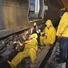 Photos: LIRR Crews Work To Fix Derailed Train In Queens